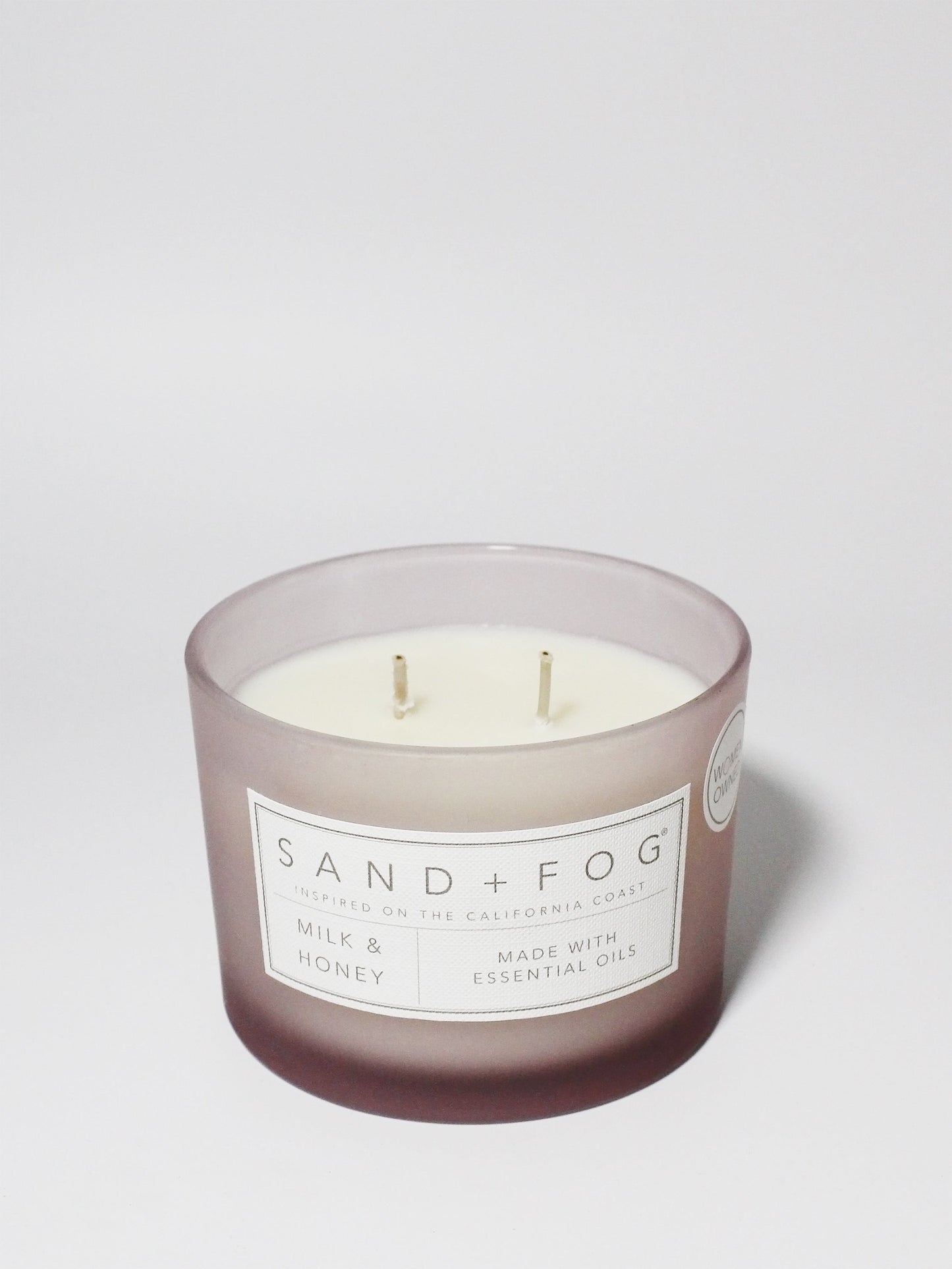 Milk & Honey 12 oz scented candle Medium Lilac vessel with Relax carved lid