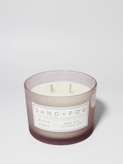 Milk & Honey 12 oz scented candle Medium Lilac vessel with Relax carved lid