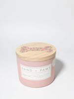 Sand + Paws Newport 12 oz scented candle Peony vessel with Painted Dog Bone lid
