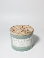 Sand + Paws Ocean & Sea Salt 12 oz scented candle Seaglass vessel with Carved Paws and Bones lid