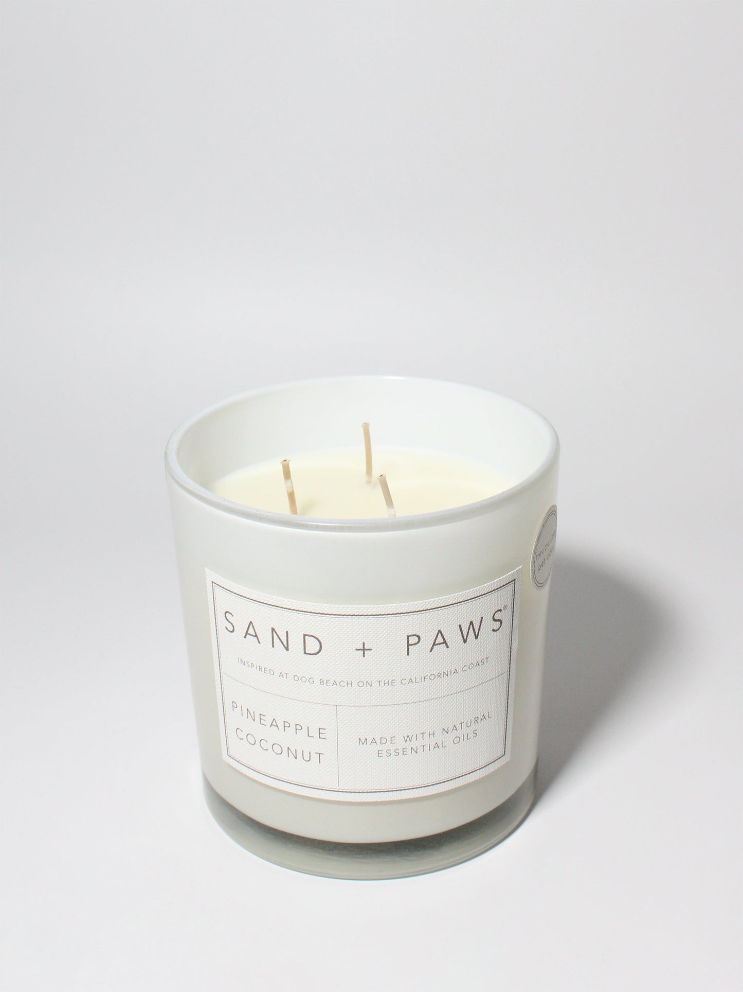 Sand + Paws Pineapple Coconut 21 oz scented candle White vessel with Multi-Breed carved wood lid
